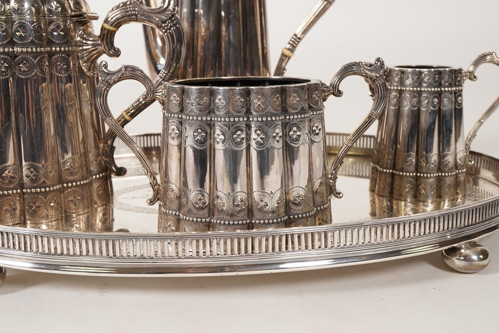 A late Victorian five piece silver tea and coffee service, all pieces with makers marks for John Edward Bingham and Walker & Hall
